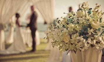 Flowers decorate a lavish wedding venue